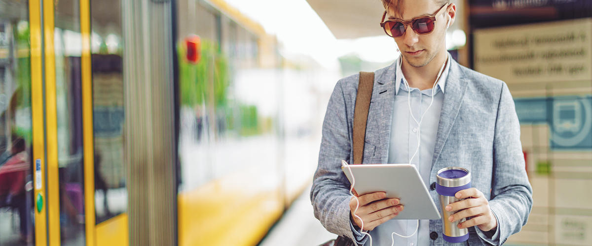 a man catching a train on his way to classes